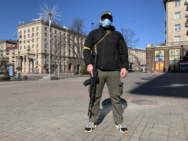 Civilian volunteer Artem standing in Kyiv