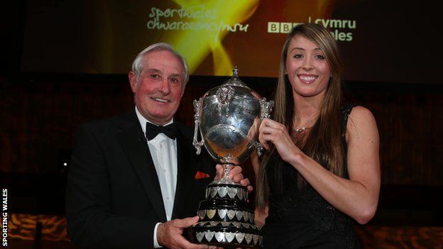 Taekwondo athlete Jade Jones receives her award from rugby great Gareth Edwards
