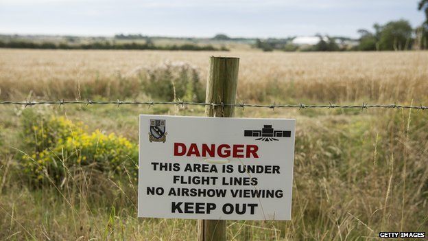 A danger sign in fields near Shoreham, England