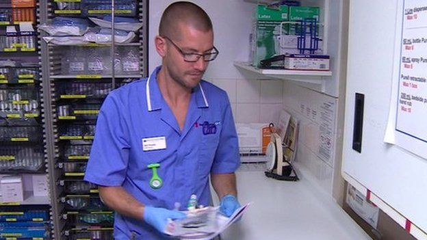 Will Pooley working as a nurse