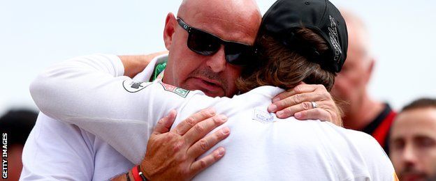 Fernando Alonso hugs Jules Bianchi's father, Philippe