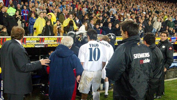 Figo leaves the pitch at full-time