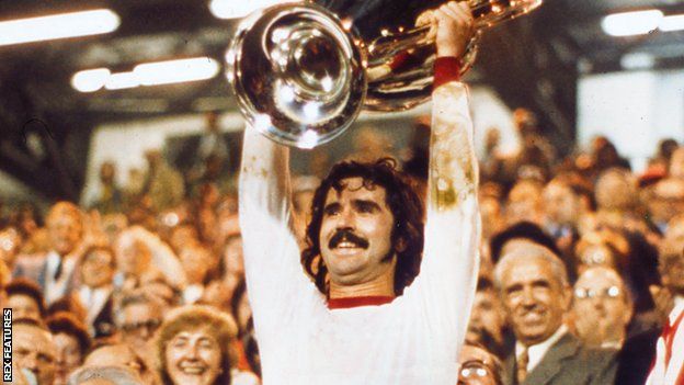 Gerd Muller lifts the European Cup trophy in 1974
