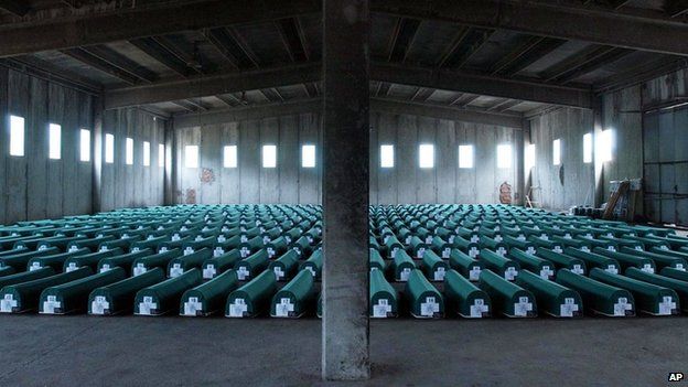 Bodies of the Srebrenica massacre lie in caskets