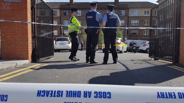 Police officers at the scene of the shooting