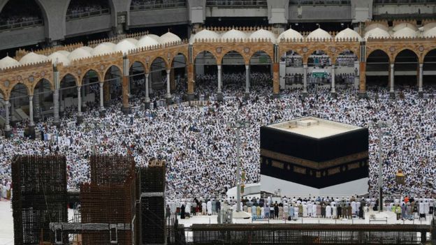 Muslim pilgrims from all around the world circlE around the Kaaba at the Grand Mosque in the Saudi city of Mecca