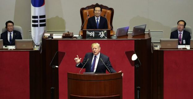 US President Donald J. Trump (C, bottom) speaks at the National Assembly in Seoul, South Korea, 8 November 2017.