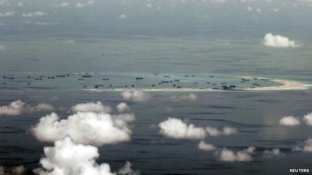 Aerial photo taken from a Philippine military plane shows the alleged ongoing land reclamation by China on Mischief Reef in the Spratly Islands