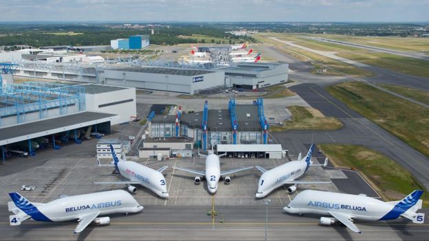 Five Beluga aircraft seen from above