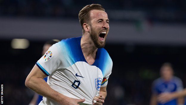 Harry Kane celebrates scoring against Italy