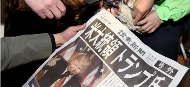 Japanese newspaper showing a headline about Trump's win.
