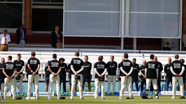 England players and support staff wear anti-discrimination T-shirts before the opening day of the first Test against New Zealand at Lord's