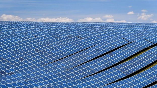 A view shows photovoltaic solar panels at the power plant in La Colle des Mées, Alpes de Haute Provence, south eastern France, on April 17, 2019.