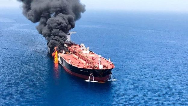 An oil tanker is seen after it was attacked at the Gulf of Oman