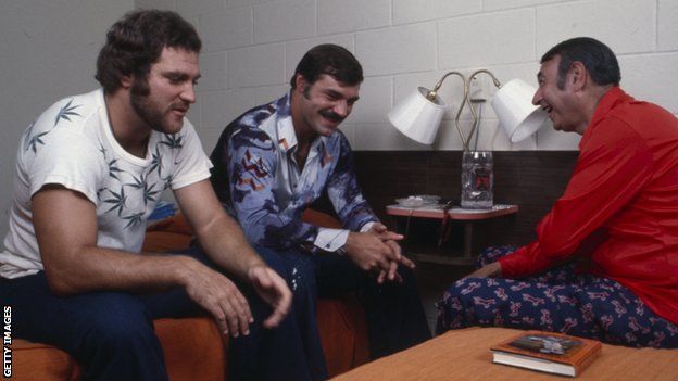Kiick (left) and Csonka (centre) are interviewed in at the Dolphins' training camp in 1973