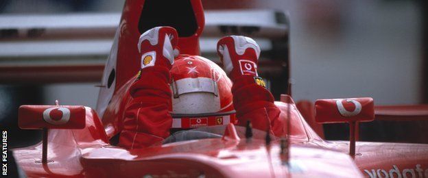 Schumacher celebrates winning the 2003 US Grand Prix