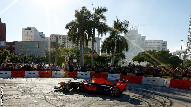 Red Bull Racing driver Patrick Friesacher does donuts during the Miami F1 festival in October 2018