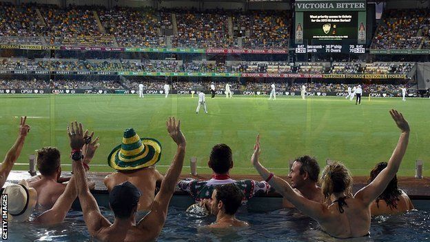 Fans in a pool watch the day-night Test between Australia and Pakistan in Brisbane, December 2016