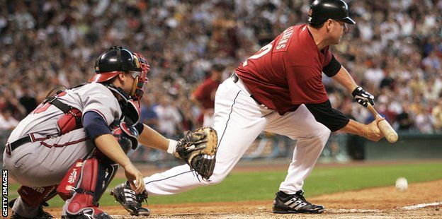 Houston Astros' Roger Clemens lays down a sacrifice bunt against the Atlanta Braves in 2005