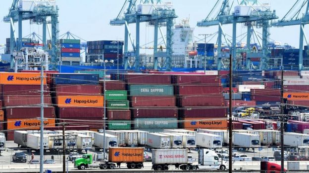 Container trucks arrive at the Port of Long Beach on August 23, 2019 in Long Beach, California