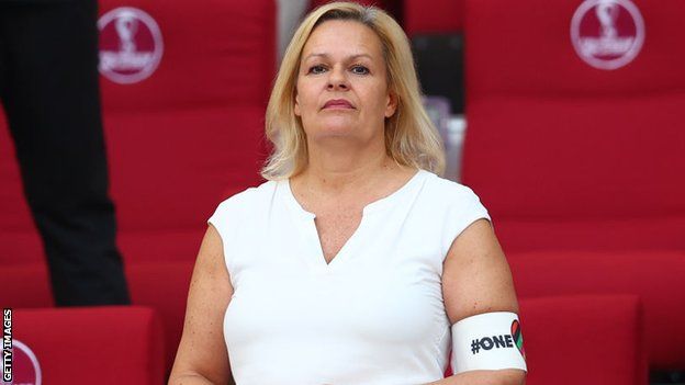 German federal minister Nancy Faeser wears the OneLove armband banned by Fifa, before Germany v Japan