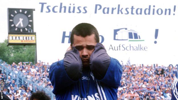 A distraught Schalke fan realises - they have not won the title