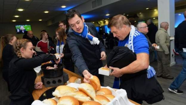 Foxes fans collecting breakfast at the King Power Stadium