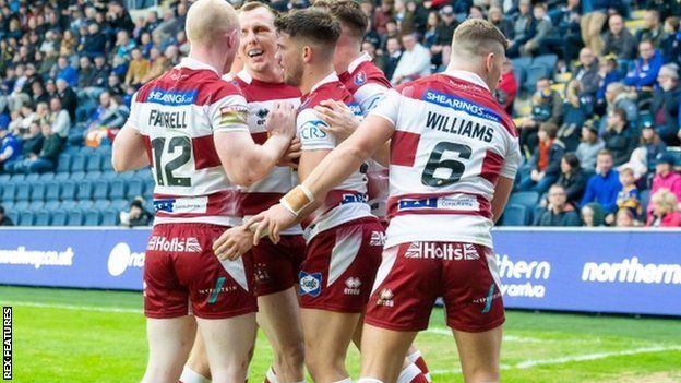 Oliver Gildart's first try helped Wigan to a fourth straight win over the Rhinos