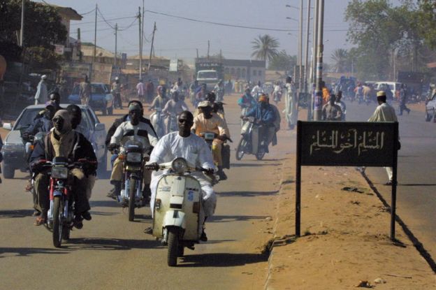 Men on motorbikes