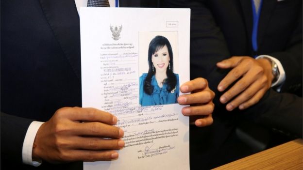 Thai Raksa Chart party leader Preechapol Pongpanich, holds up application of candidate for Prime Minister, Thailand's Princess Ubolratana Rajakanya Sirivadhana Varnavadi,