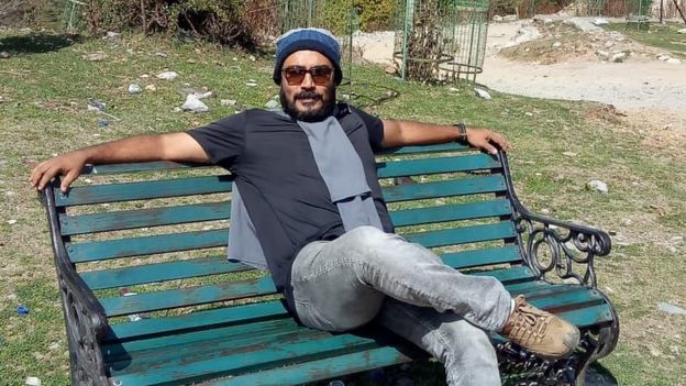 Ratheesh Sukumaran sitting on a bench