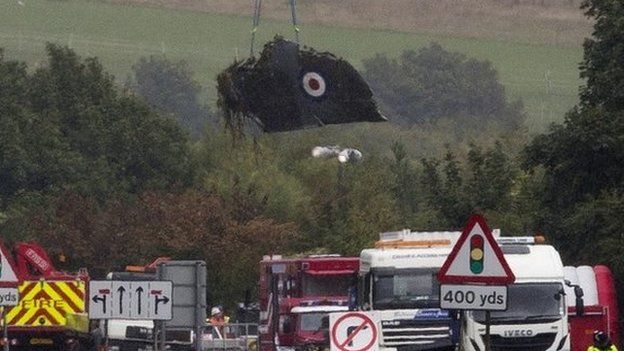 Wreckage of Hawker Hunter jet being removed