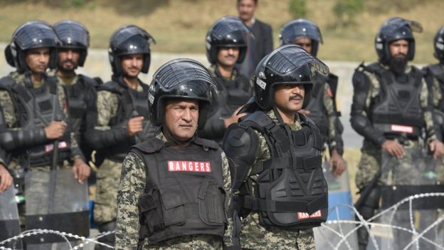 Pakistani paramilitary soldiers take positions near to the supporters of religous group 'Tehrik Labayk Ya Rasool Allah (TLYRA)' during a protest in Islamabad, Pakistan, 26 November 2017.