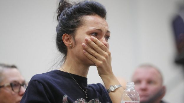 Employee of the Ukraine International Airlines (UIA) company reacts during a press conference at Boryspil International Airport in Kiev, Ukraine, 08 January 2020