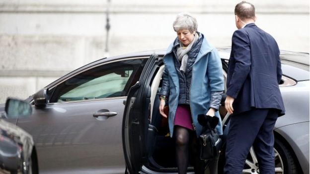 Theresa May getting out of car