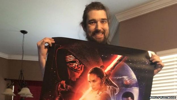 Picture of terminally ill man, Daniel, holding Star Wars poster
