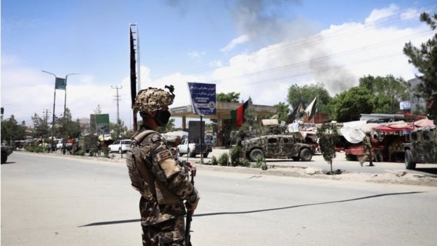 An Afghan soldier stands guard near the scene of an attack at an MSF (Doctors without Borders) clinic in Kabul, Afghanistan, 12 May 2020.