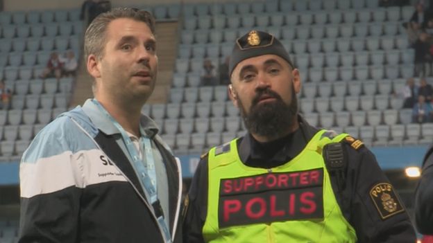 The Malmo supporter liaison officer Pierre Nordberg and policeman Gorgin Shoai