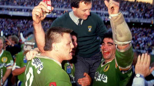Tim Sheens, coach of the Raiders is chaired up by Glenn Lazarus and Mal Meninga after winning the 1989 NSWRL Grand Final