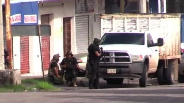 Armed people are seen in CuliacÃ¡n, Sinaloa state, Mexico. Photo: 17 October 2019