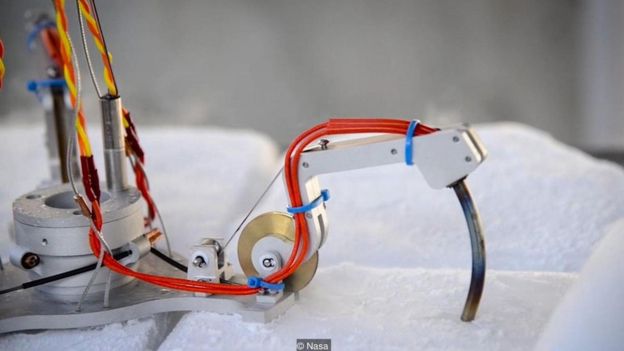 The liquid water will probably be reached by a robot drilling through the layers of ice