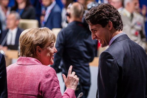 Angela Merkel and Justin Trudeau at the Nato summit in Warsaw in July 2016