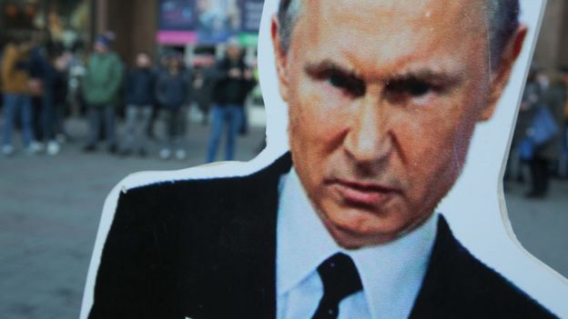 путін