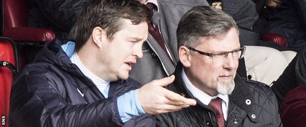 Hearts coach Jon Daly chats with Craig Levein at Pittodrie
