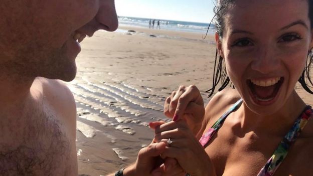 Joanna showing her engagement ring to the camera