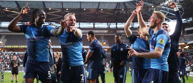 Wycombe players celebrate