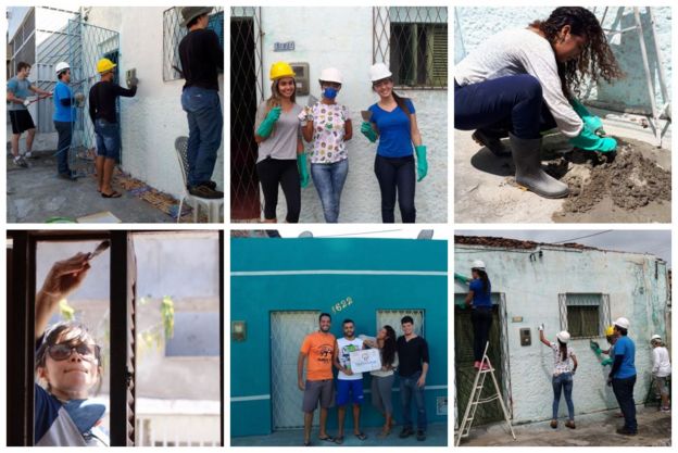 Imagem mostra voluntários trabalhando em reforma de casas em Natal