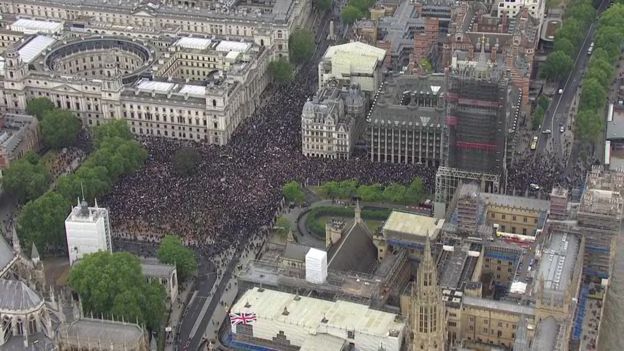 Crowds gather in Parliament Square