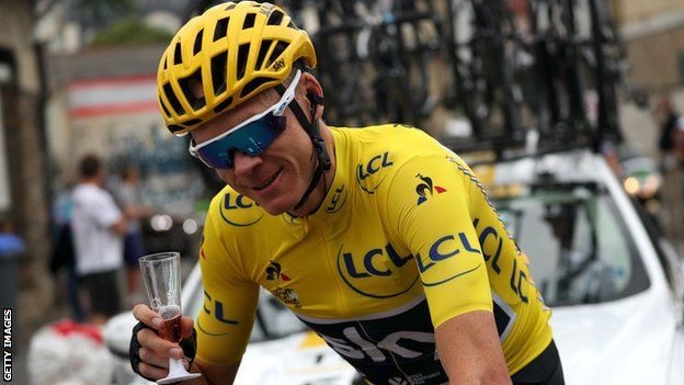 Chris Froome celebrates his fourth Tour de France win