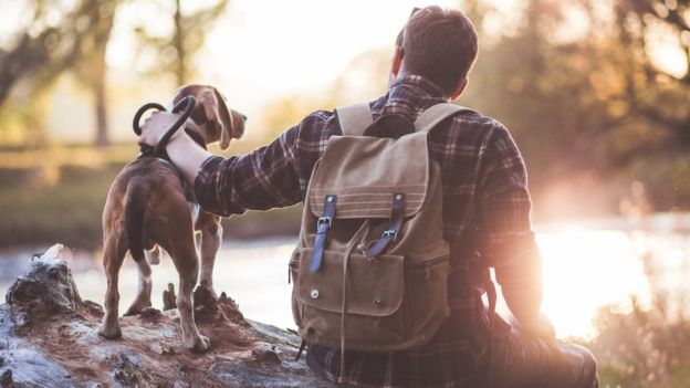 A man with a dog